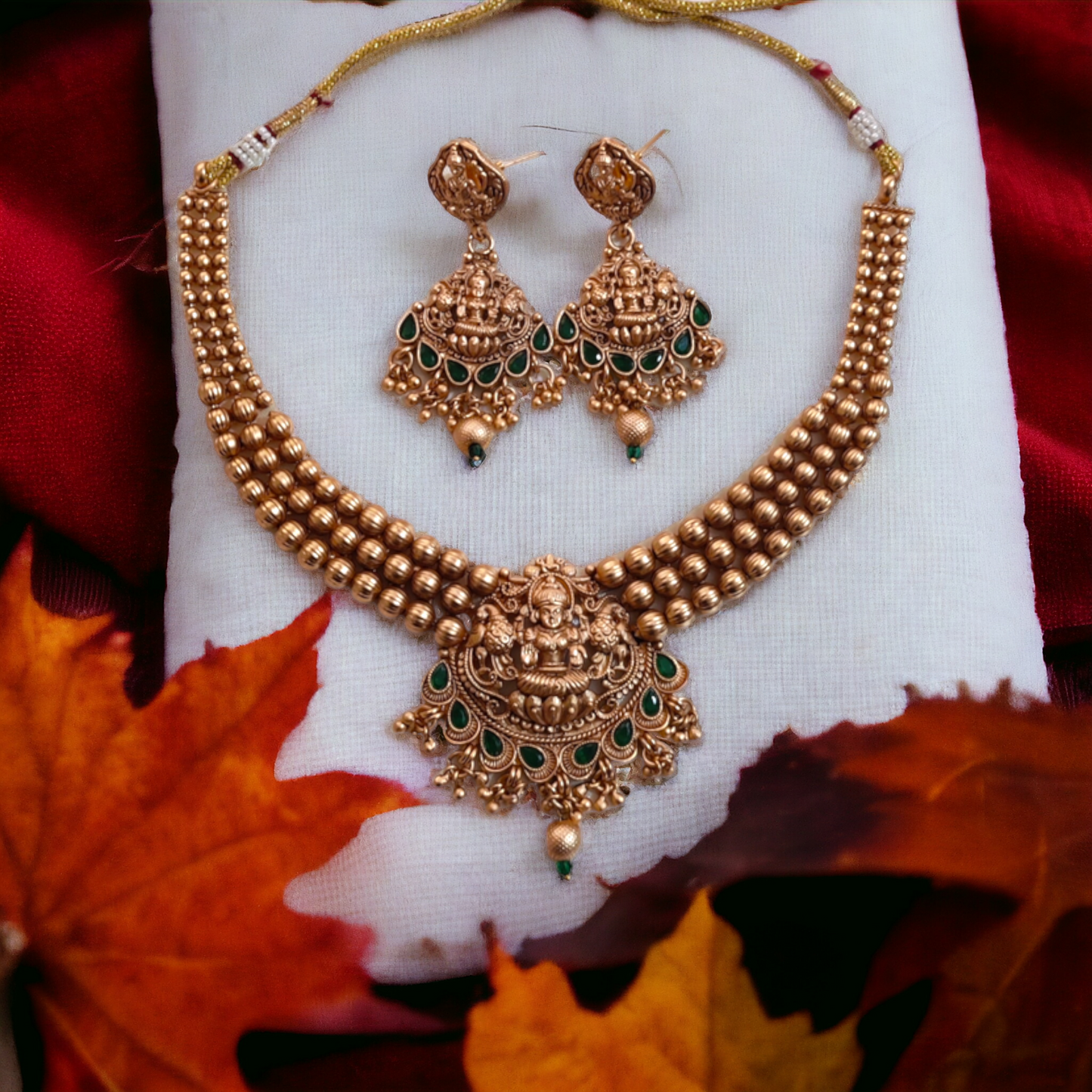 Golden Beads Studded With Green Kundan Lakshmi Necklace - TS07