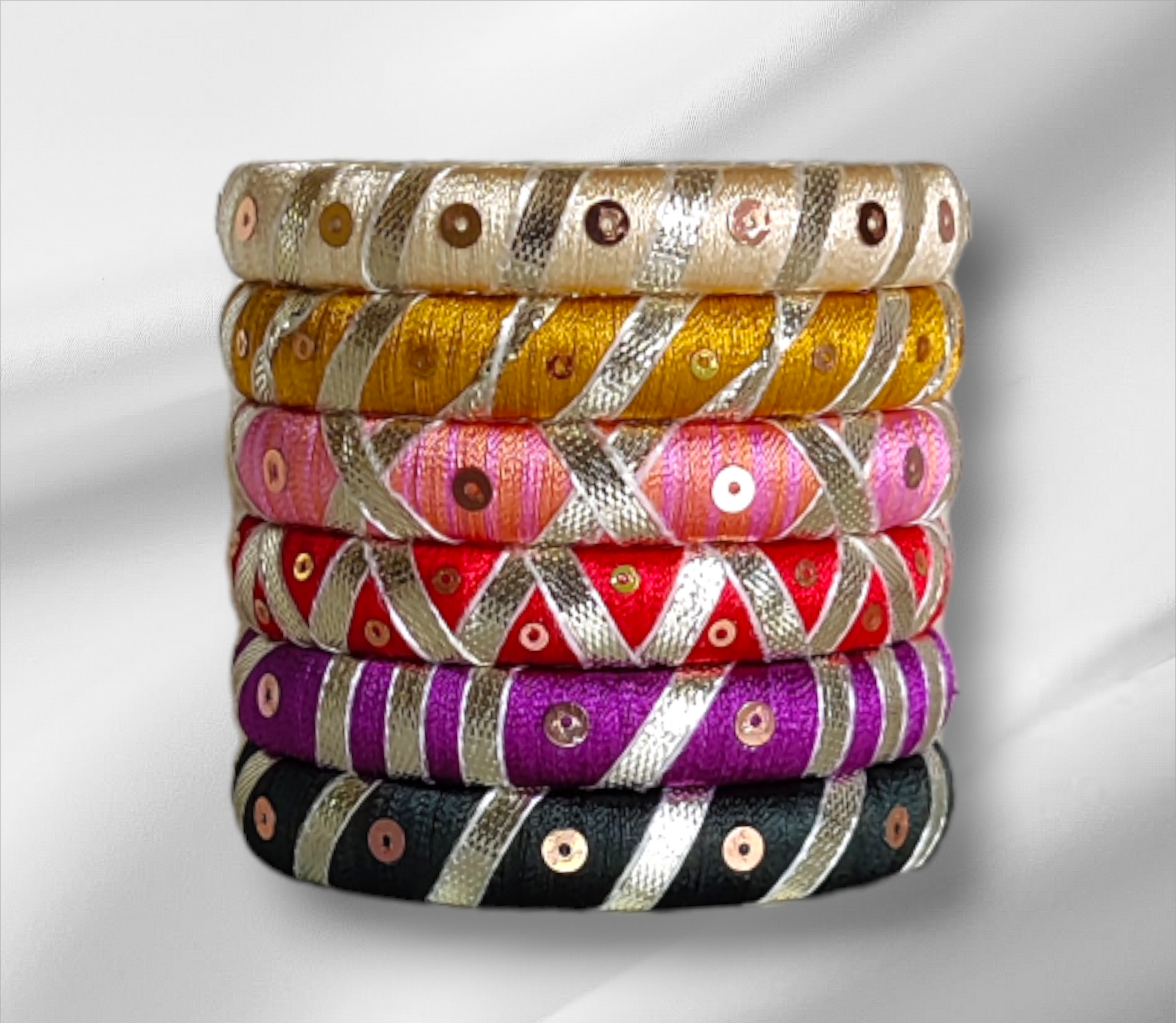 Taasha, handmade bagles, silk thread bangles, handmade bangles, handicrafts