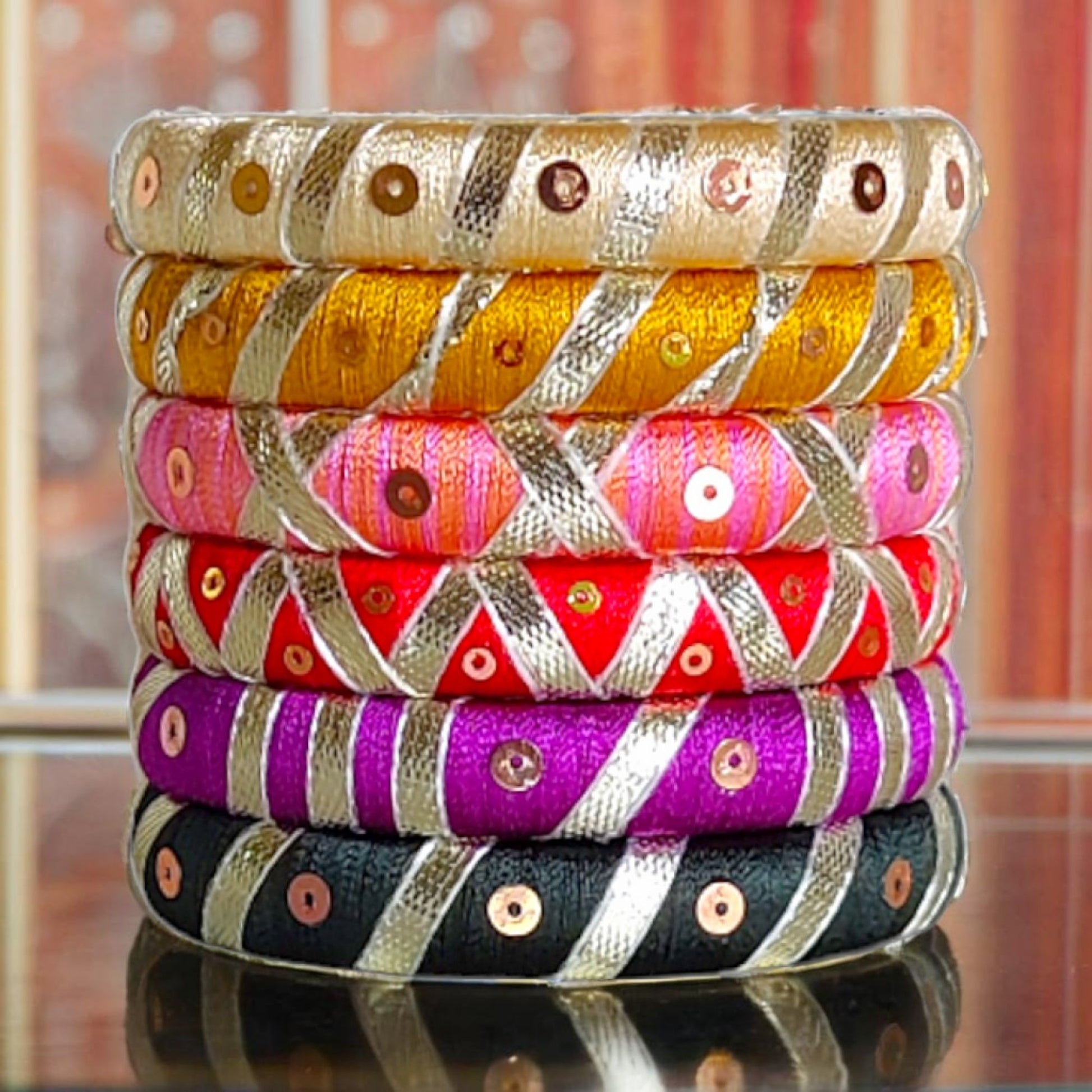 Taasha, handmade bagles, silk thread bangles, handmade bangles, handicrafts
